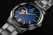 Orient Helios RA-AG0028L10A sport casual watch open heart silver blue